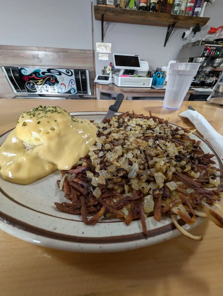 Eggs Benedict and Hash Browns with Onions
